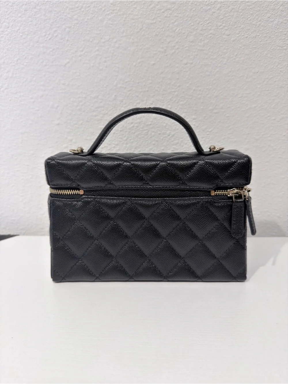 Quilted Black Top-Handle Vanity Bag
